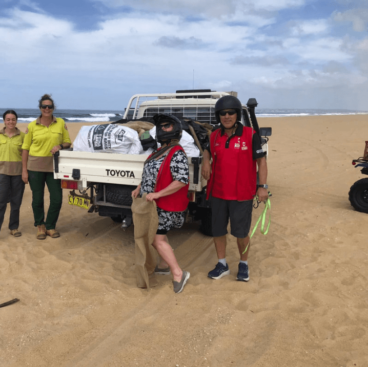 Quad Bike King team cleaning up Stockton Beach